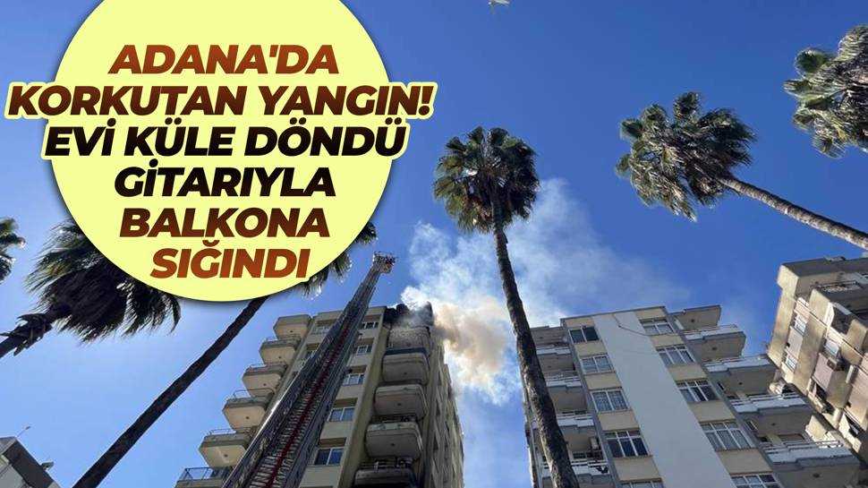 Adana'da apartmanda çıkan yangında ev sahibi gitarıyla balkona sığındı