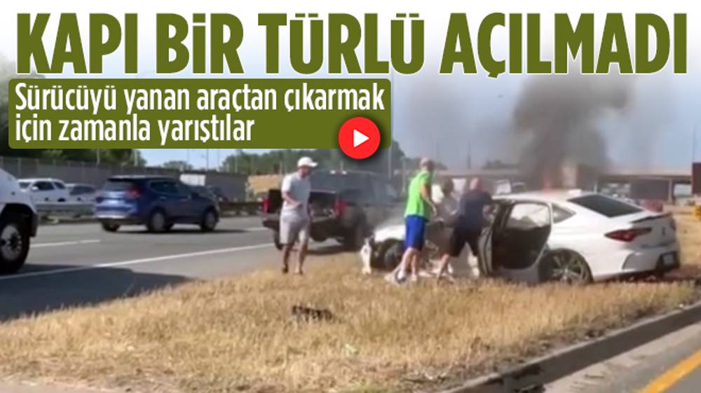 Yanan aracın sürücüsünü kurtarmak için zamanla yarıştılar