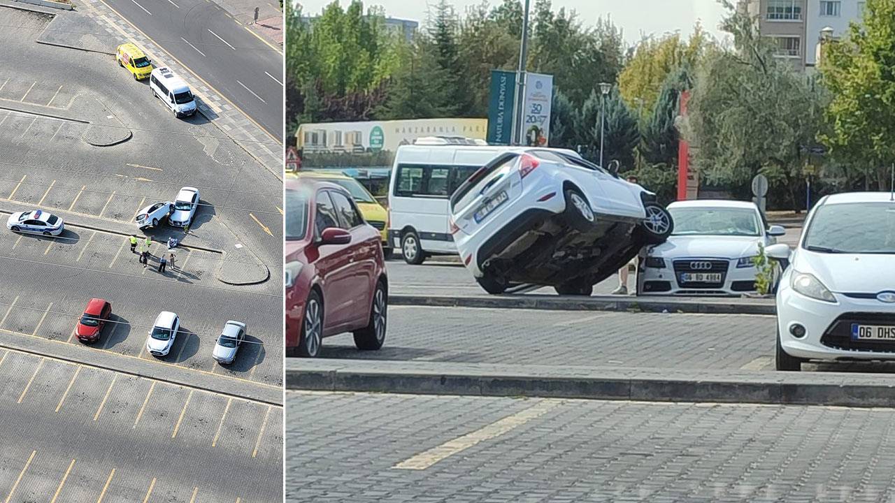 Boş otoparkta aracın üstüne çıktı